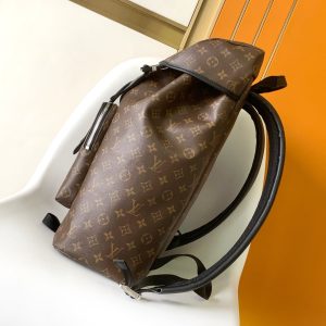 Alternative view of p650ZACK Backpack This sporty coated canvas Zack backpack offers ample capacity while showcasing classic Louis Vuitton style. The flap, drawstring closure, and metal buckles are all signature Louis Vuitton design elements.Detailed Features 22 x 44 x 15 cm (L x H x W) Monogram Macassar coated canvas Leather trim lining Silver-tone hardware 2 leather shoulder straps Flap + drawstring + buckle closure 1 padded interior compartment 1 double-pocket interior slip pocket Handle: Single handle